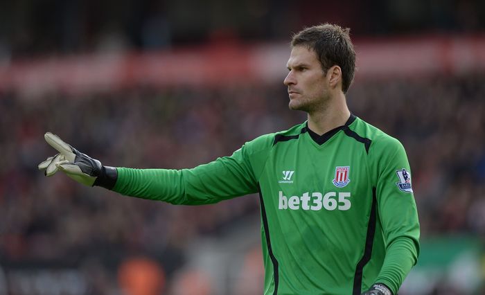 Asmir Begovic STOKE ON TRENT, ENGLAND - OCTOBER 19: Asmir Begovic of Stoke City during the Premier League match between Stoke City and Swansea City at Britannia Stadium on October 19, 2014 in Stoke on Trent, England. (Photo by Gareth Copley/Getty Images)