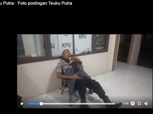 Viral Polisi di Aceh Utara Jaga Kotak Suara Sambil Momong Anak