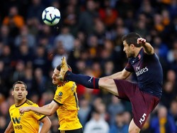 Meski bermain menekan di babak awal, kesempatan demi kesempatan untuk merobek gawang Wolves masih terlewatkan oleh Arsenal. Eddie Keogh/Reuters.