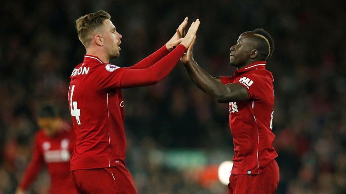 Premier League - Liverpool v Huddersfield Town - Anfield, Liverpool, Britain - April 26, 2019 Liverpools Sadio Mane celebrates scoring their fourth goal with Jordan Henderson REUTERS/Andrew Yates EDITORIAL USE ONLY. No use with unauthorized audio, video, data, fixture lists, club/league logos or 
