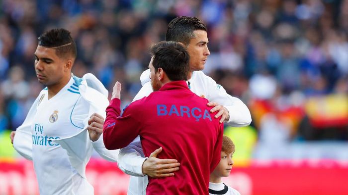 Cristiano Ronaldo dan Lionel Messi juara liga bersamaan musim ini (Gonzalo Arroyo Moreno/Getty Images) Cristiano Ronaldo dan Lionel Messi juara liga bersamaan musim ini (Gonzalo Arroyo Moreno/Getty Images)
