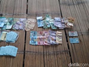 Polisi Ciduk Preman yang Memalak Wisatawan di Pantai Santolo Polisi Ciduk Preman yang Memalak Wisatawan di Pantai Santolo