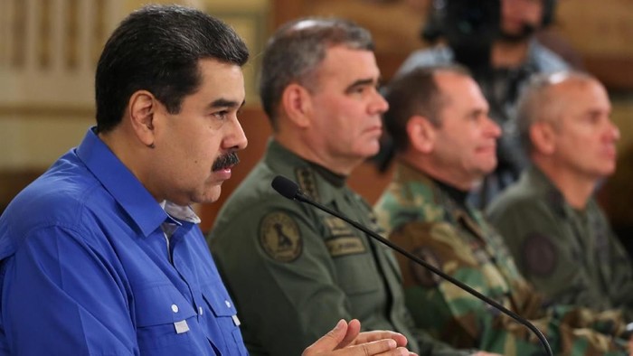 Venezuelas President Nicolas Maduro speaks during a broadcast with members of the government and military high command members at Miraflores Palace in Caracas, Venezuela April 30, 2019. Miraflores Palace/Handout via REUTERS ATTENTION EDITORS - THIS PICTURE WAS PROVIDED BY A THIRD PARTY.