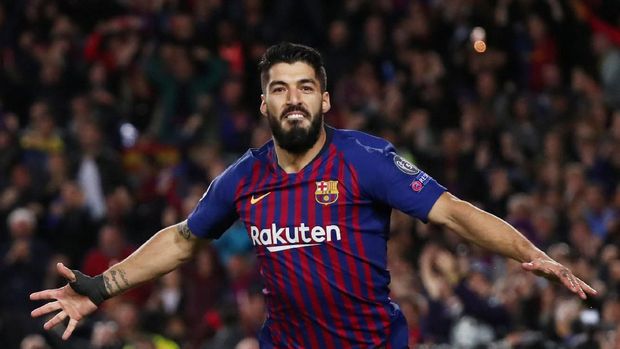 Luis Suarez dalam ancaman Antoine Griezmann.