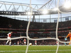 Arsenal menyamakan skor di menit ke-18. Alexandre Lacazette melesakkan gol usai menyambar umpan Pierre-Emerick Aubamenyang. (Foto: David Klein/Reuters)