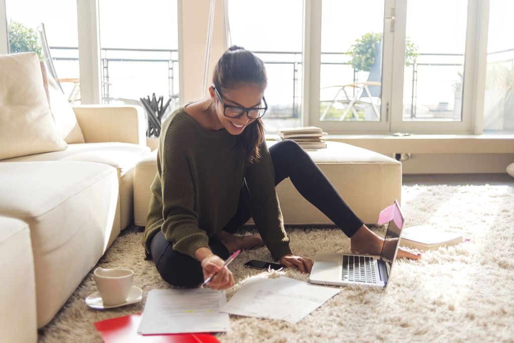 Close up of female accountant or banker making calculations