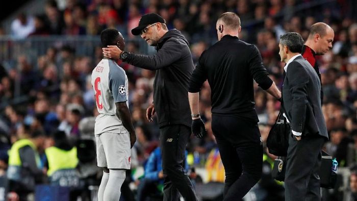 Naby Keita mengalami cedera dan tak akan main lagi untuk Liverpool di musim ini (Foto: Albert Gea/Reuters) Naby Keita mengalami cedera dan tak akan main lagi untuk Liverpool di musim ini (Foto: Albert Gea/Reuters)