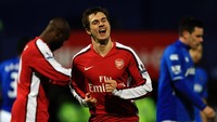 Pada 22 Agustus 2009, Ramsey mencetak gol pertamanya di Liga Inggris dalam kemenangan 4-1 Arsenal atas Portsmouth. (Foto: Bryn Lennon/Getty Images)