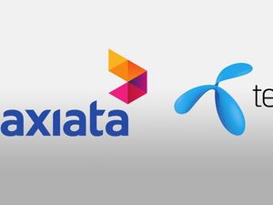 Induk XL Axiata Batal Merger dengan Telenor Induk XL Axiata Batal Merger dengan Telenor