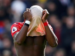 Paul Pogba sampai menutup wajah setelah pertandingan, Minggu (5/5/2019) malam WIB. MU tak cuma gagal lolos ke Liga Champions, tapi juga puasa gelar. (Foto: Jason Cairnduff/Action Images via Reuters)