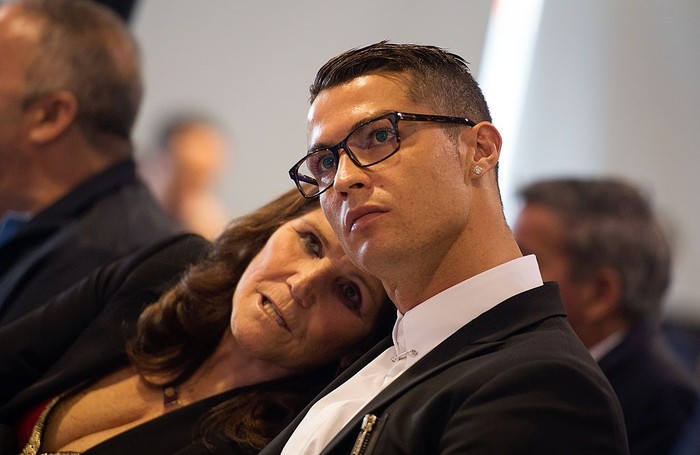 MADRID, SPAIN - NOVEMBER 07:  Cristiano Ronaldo of Real Madrid looks on with his mother Maria Dolores dos Santos Aveiro during his press conference after signing a new five-year contract with the Spanish club at the Santiago Bernabeu stadium on November 7, 2016 in Madrid, Spain.  (Photo by Denis Doyle/Getty Images)