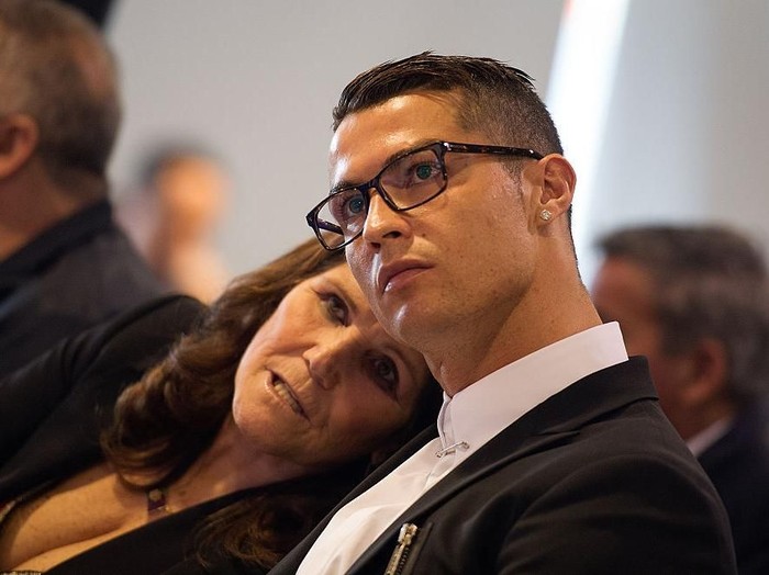 MADRID, SPAIN - NOVEMBER 07:  Cristiano Ronaldo of Real Madrid looks on with his mother Maria Dolores dos Santos Aveiro during his press conference after signing a new five-year contract with the Spanish club at the Santiago Bernabeu stadium on November 7, 2016 in Madrid, Spain.  (Photo by Denis Doyle/Getty Images)