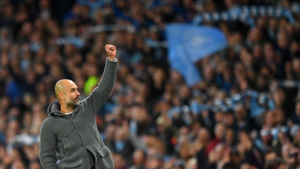 Pep Guardiola merayakan kemenangan Manchester City atas Leicester City. (Foto: Michael Regan/Getty Images)