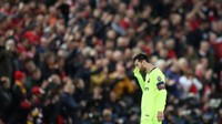 Lionel Messi menutup muka di hadapan pendukung Anfield. Dia pemain Barca paling mengancam gawang Liverpool, ada 5 tembakan ke gawang yang dilepaskan. (Foto: Carl Recine/Action Images via Reuters)