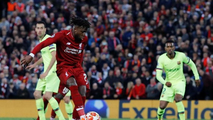 Liverpool vs Barcelona Soccer Football - Champions League Semi Final Second Leg - Liverpool v FC Barcelona - Anfield, Liverpool, Britain - May 7, 2019 Liverpools Divock Origi scores their fourth goal REUTERS/Phil Noble
