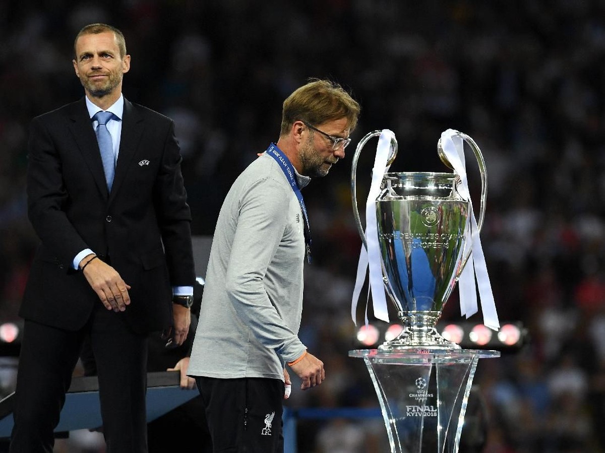 Juergen Klopp didukung Jose Mourinho untuk memenangi Liga Champions musim ini (David Ramos/Getty Images)