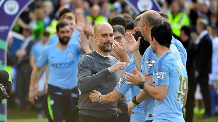 Manajer Manchester City, Josep Guardiola, merayakan kesuksesan menjuarai Liga Inggris. (Foto: Toby Melville/Reuters) Manajer Manchester City, Josep Guardiola, merayakan kesuksesan menjuarai Liga Inggris. (Foto: Toby Melville/Reuters)