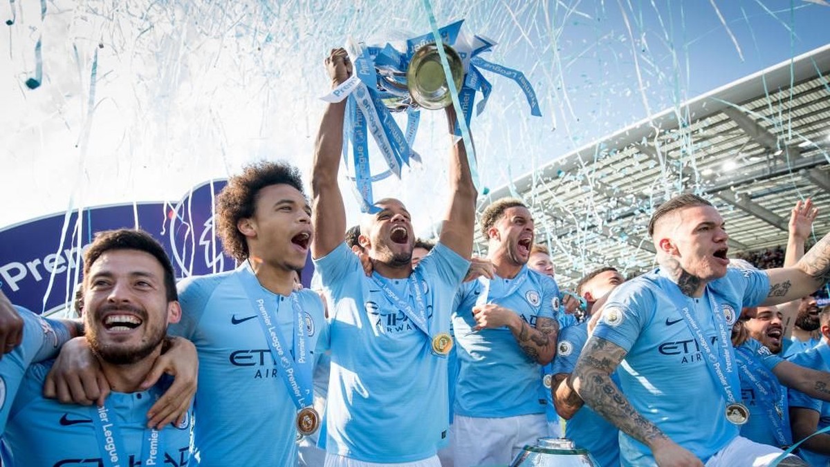 Manchester City mempertahankan gelar Premier League sekaligus memenangi treble domestik. (Foto: Michael Regan/Getty Images)