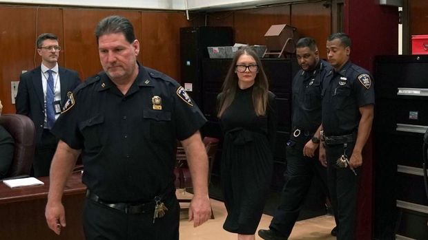 Fake German heiress Anna Sorokin arrives in court  during her sentencing at Manhattan Supreme Court May 9, 2019 following her conviction last month on multiple counts of grand larceny and theft of services (Photo by TIMOTHY A. CLARY / AFP)