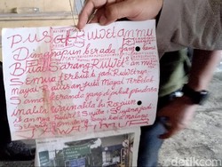 Kertas dengan Tulisan Warna Merah Ditemukan di Lokasi Mayat Mutilasi