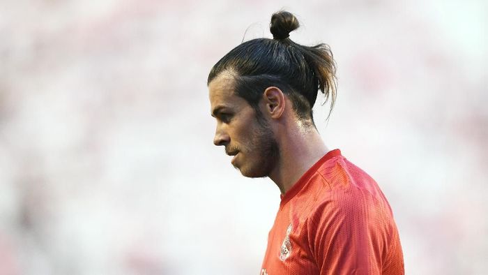 Gareth Bale disarankan agar meninggalkan Real Madrid (Foto: Denis Doyle / Getty Images)