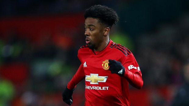 MANCHESTER, ENGLAND - DECEMBER 26: Angel Gomes of Manchester United in action during the Premier League match between Manchester United and Huddersfield Town at Old Trafford on December 26, 2018 in Manchester, United Kingdom. (Photo by Clive Brunskill/Getty Images)