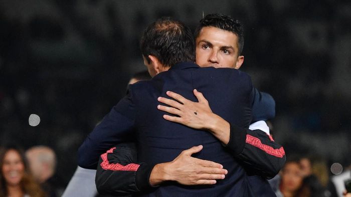 Cristiano Ronaldo memeluk Massimiliano Allegri (Tullio M. Puglia/Getty Images) Cristiano Ronaldo memeluk Massimiliano Allegri (Tullio M. Puglia/Getty Images)