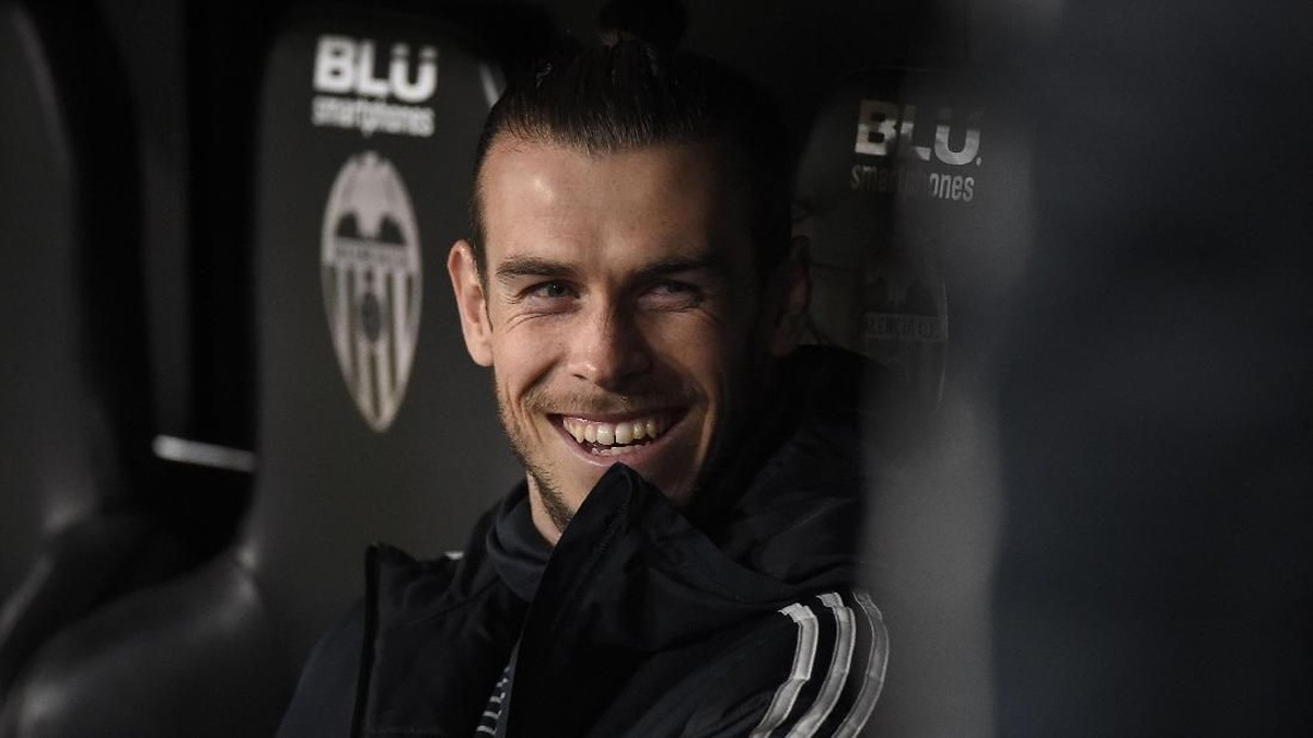 Gareth Bale sangat mungkin bertahan di Real Madrid musim depan  (JOSE JORDAN / AFP)