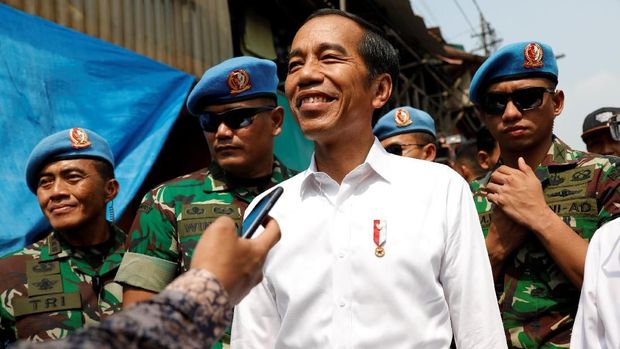 Loreng-loreng Pengawal Jokowi di Aksi 22 Mei