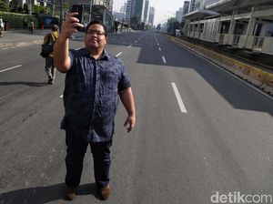 Pekerja Kantoran di Kawasan Thamrin Mulai Hilir Mudik Pekerja Kantoran di Kawasan Thamrin Mulai Hilir Mudik