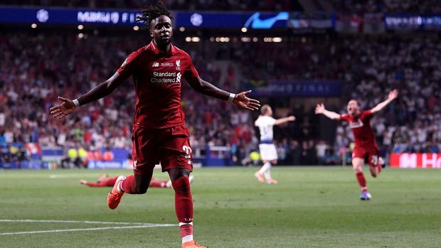 MADRID, SPAIN - JUNE 01: Divock Origi of Liverpool celebrates after scoring his team's second goal during the UEFA Champions League Final between Tottenham Hotspur and Liverpool at Estadio Wanda Metropolitano on June 01, 2019 in Madrid, Spain. (Photo by Laurence Griffiths/Getty Images)