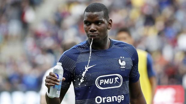 Paul Pogba dirumorkan bakal merapat ke Real Madrid. (