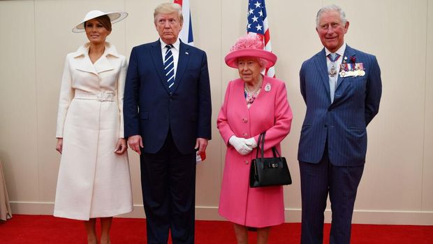 PORTSMOUTH, ENGLAND - JUNE 05:  President of the United States, Donald Trump and First Lady of the United States, Melania Trump sit next to Queen Elizabeth II as they attend the D-Day Commemorations on June 5, 2019 in Portsmouth, England. The political heads of 16 countries involved in World War II joined Her Majesty, The Queen on the UK south coast for a service to commemorate the 75th anniversary of D-Day. Overnight it was announced that all 16 had signed a historic proclamation of peace to ensure the horrors of the Second World War are never repeated. The text has been agreed by Australia, Belgium, Canada, Czech Republic, Denmark, France, Germany, Greece, Luxembourg, Netherlands, Norway, New Zealand, Poland, Slovakia, the United Kingdom and the United States of America. (Photo by Dan Kitwood/Getty Images)