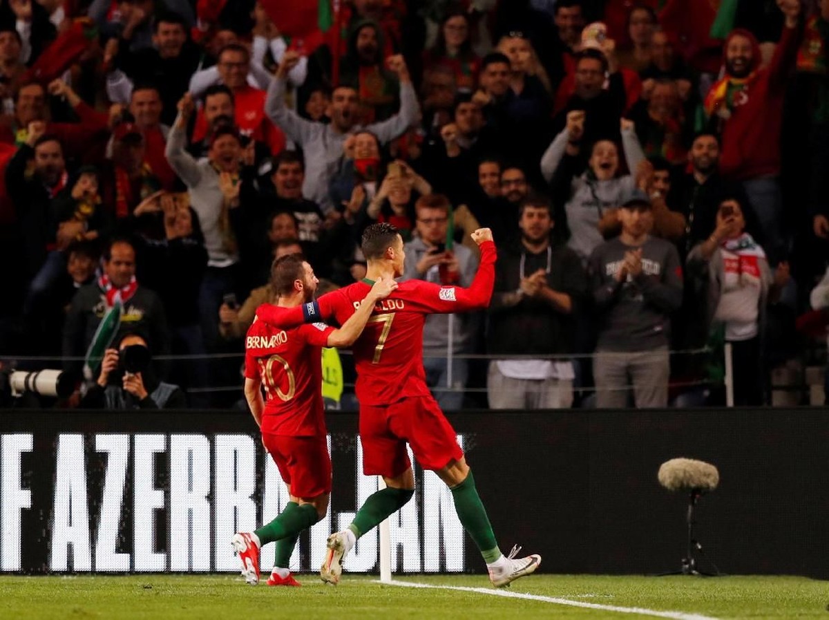 Timnas Portugal merayakan keberhasilan lolos ke final UEFA Nations League. (Foto: Rafael Marchante/Reuters)
