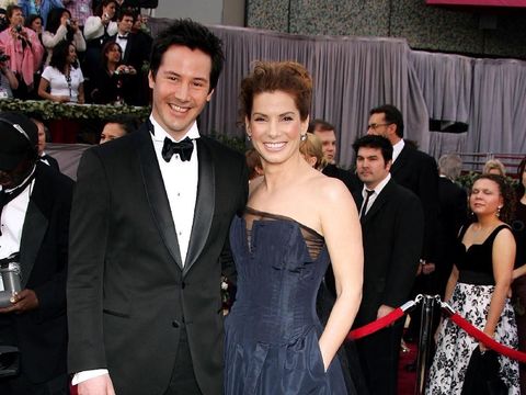 HOLLYWOOD - MARCH 5:  Actors Keanu Reeves and Sandra Bullock arrive at the 78th Annual Academy Awards at the Kodak Theatre on March 5, 2006 in Hollywood, California.  (Photo by Frazer Harrison/Getty Images)