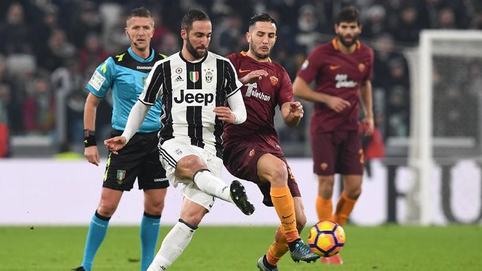 Juventus kabarnya ingin menukar Gonzalo Higuain dengan Kostas Manolas (Foto: Valerio Pennicino/Getty Images) Juventus kabarnya ingin menukar Gonzalo Higuain dengan Kostas Manolas (Foto: Valerio Pennicino/Getty Images)
