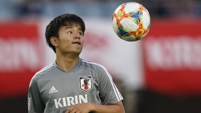 Takefusa Kubo resmi jadi pemain Real Madrid (Foto: Toru Hanai/Getty Images) Takefusa Kubo resmi jadi pemain Real Madrid (Foto: Toru Hanai/Getty Images)