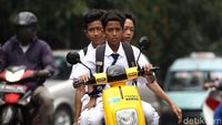 Jangan Ditiru! Aksi Pemotor Bonceng Tiga Marak di Jakarta