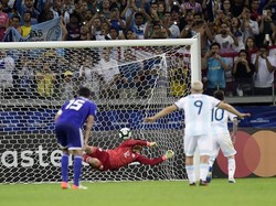 Messi maju sebagai eksekutor. Pemain Barcelona itu sukses menjalankan tugasnya dan membawa Argentina mengimbangi Paraguay 1-1 di menit ke-57. Juliana Flister/Getty Images