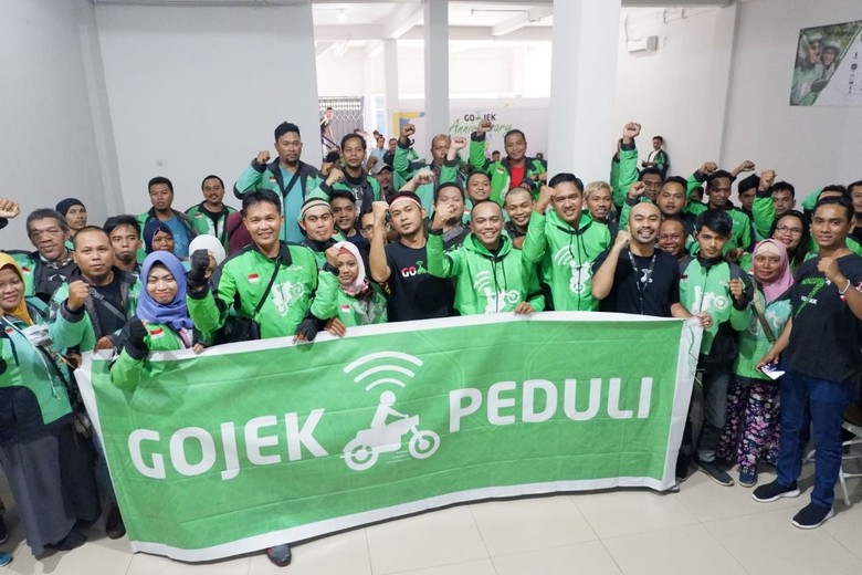 Go-Jek Bantu Ratusan Mitra Driver Korban Banjir Samarinda
