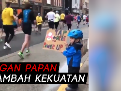 Gemas! Lihat Bocah Ini Beri Dukungan untuk Para Pelari