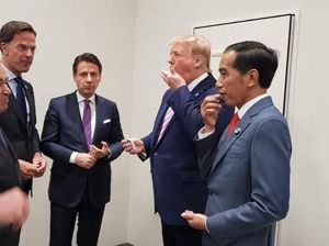 Trump Berbagi Permen Sambil Bincang Santai dengan Jokowi