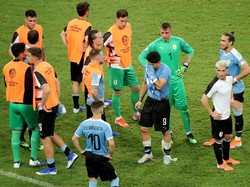 Satu-satunya eksekutor Uruguay yang gagal adalah Suarez. Striker asal Barcelona itu maju sebagai penendang pertama. Sergio Moraes/Reuters.
