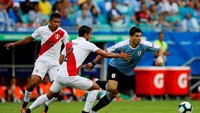 Dalam pertandingan itu tak ada gol hingga laga 90 menit berakhir. Uruguay dan Peru harus melanjutkannya ke adu penalti untuk menentukan pemenang. Luisa Gonzalez/Reuters.