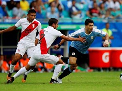 Dalam pertandingan itu tak ada gol hingga laga 90 menit berakhir. Uruguay dan Peru harus melanjutkannya ke adu penalti untuk menentukan pemenang. Luisa Gonzalez/Reuters.