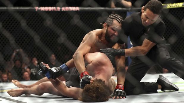 LAS VEGAS, NEVADA - JULY 06: Jorge Masvidal of the United States knocks out Ben Askren of the United States during their UFC 239 Welterweight Bout at T-Mobile Arena on July 06, 2019 in Las Vegas, Nevada. Sean M. Haffey/Getty Images/AFP