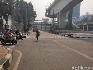 Lomba Maraton Usai, Lalin Jalan HR Rasuna Said Kembali Dibuka Lomba Maraton Usai, Lalin Jalan HR Rasuna Said Kembali Dibuka