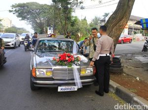 Polisi Tegur Pemilik Mobil Berpelat Nomor MARRIED Polisi Tegur Pemilik Mobil Berpelat Nomor MARRIED