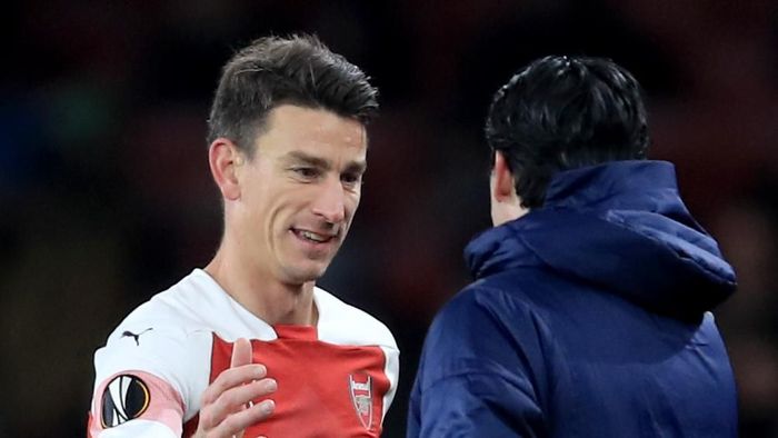 Manajer Arsenal Unai Emery menunggu keputusan Laurent Koscielny. (Foto: Marc Atkins / Getty Images) Manajer Arsenal Unai Emery menunggu keputusan Laurent Koscielny. (Foto: Marc Atkins / Getty Images)