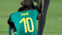Sadio Mane tertunduk. Tak ada piala tambahan bagi Mane setelah menjuarai Liga Champions 2018/19 bersama Liverpool. Foto: Amr Abdallah Dalsh / Reuters